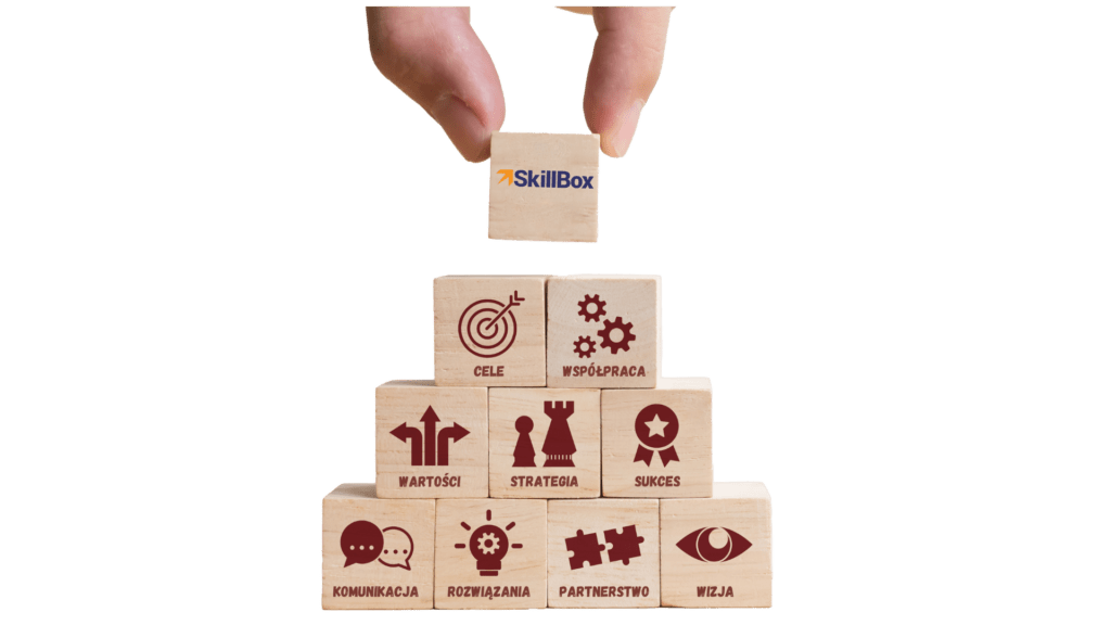 Wieża z klocków z napisanymi na nich hasłami